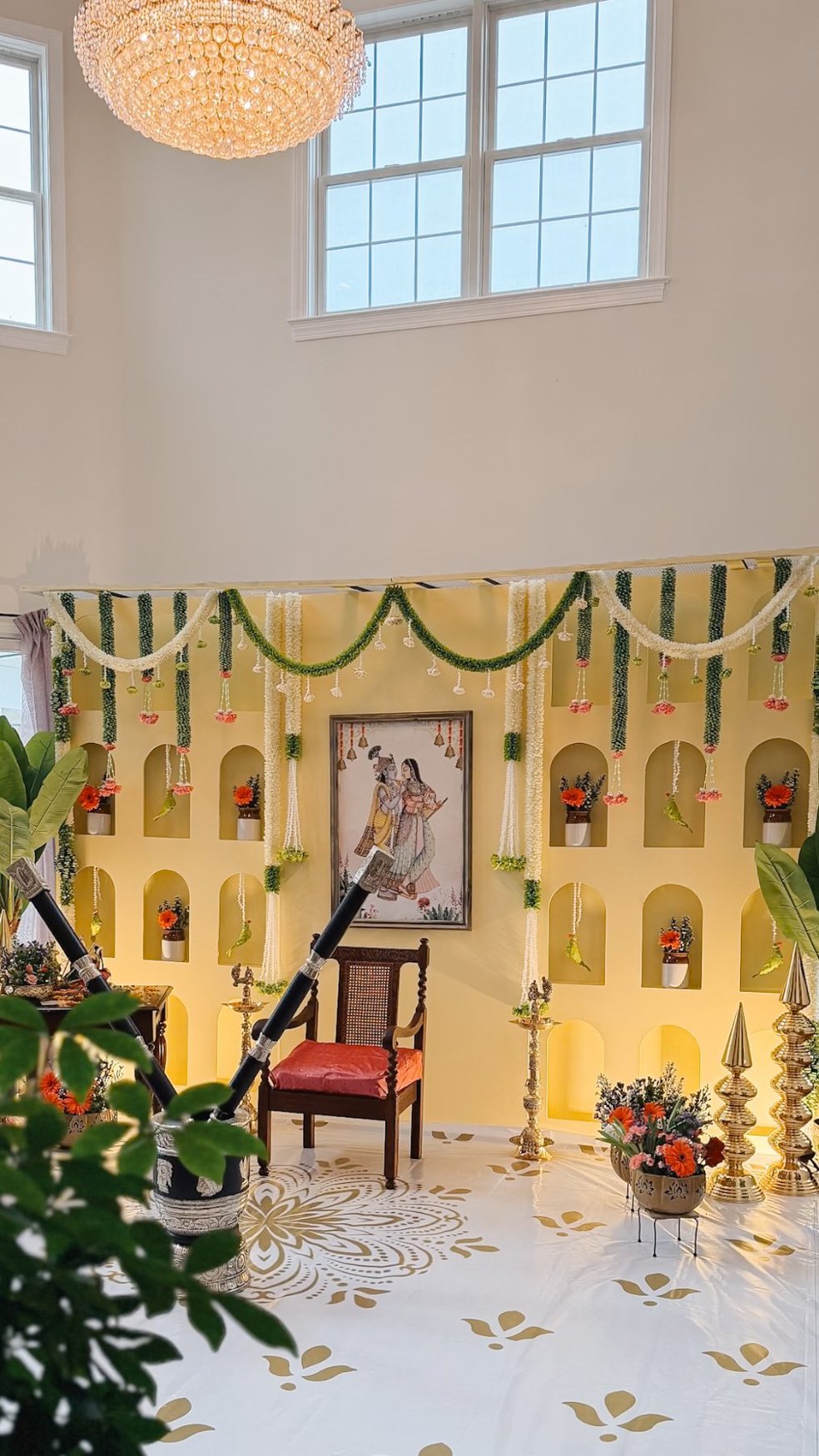 Yellow ceremony stage with decorative niches
