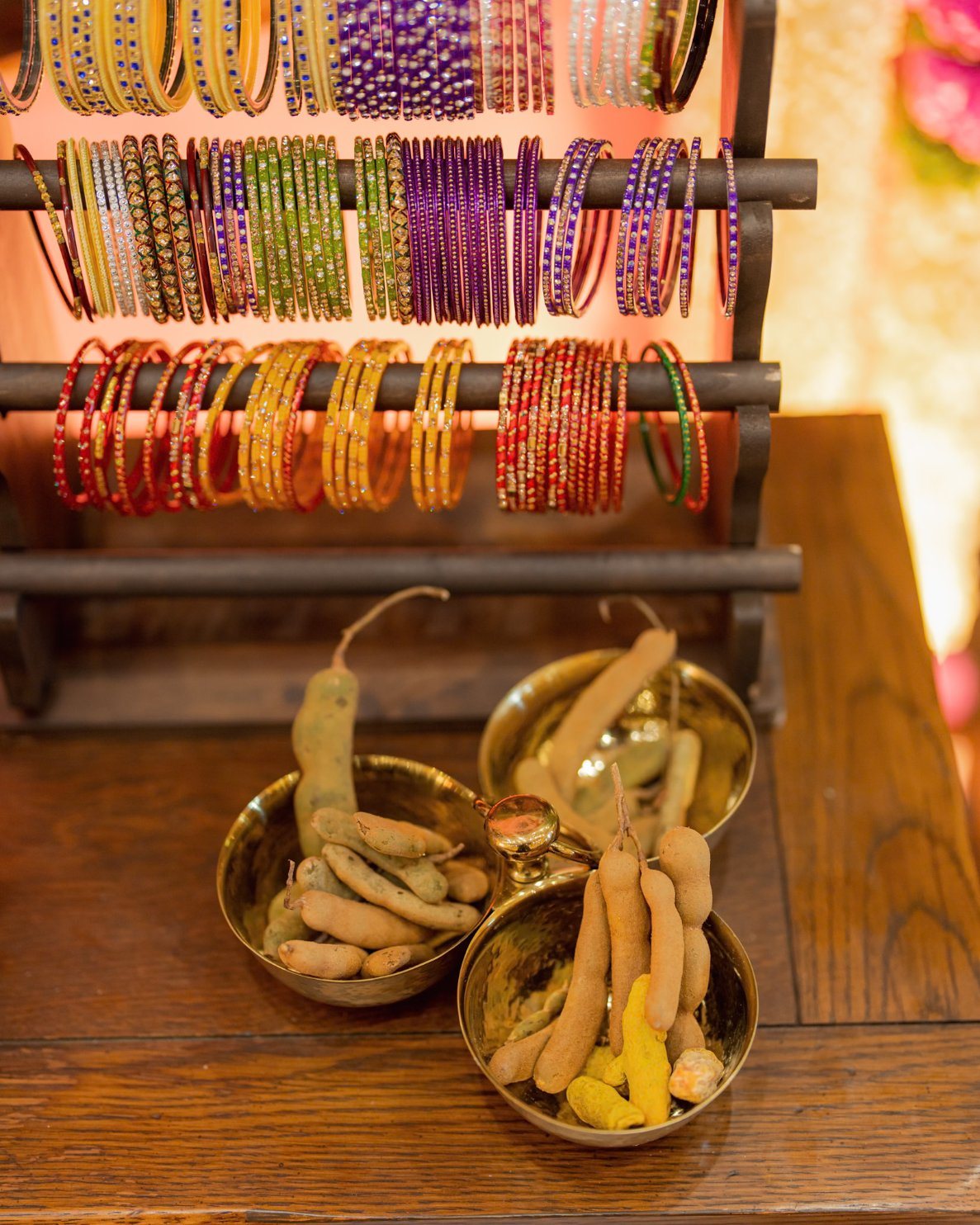 Close detail of a flower-trimmed bangle stand