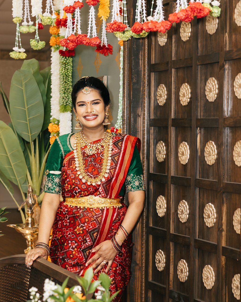 Bride portrait beside wedding décor